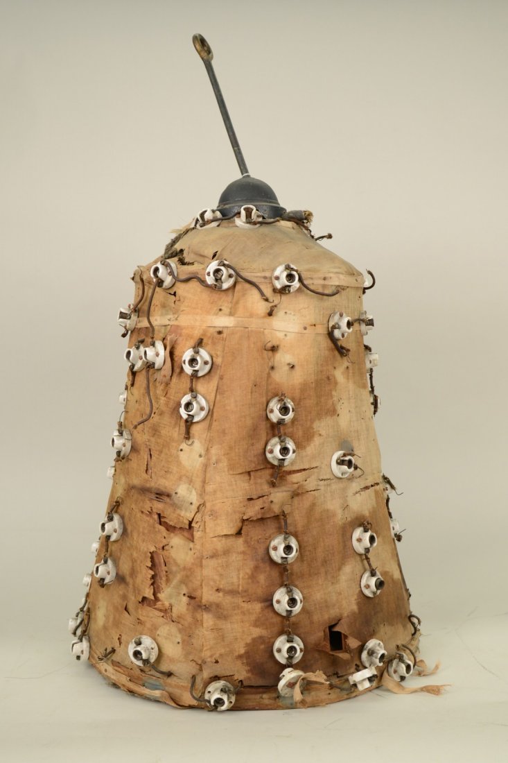 VARIABLE RESISTANCE LIGHT BULB TESTER, mounted on a rat: VARIABLE RESISTANCE LIGHT BULB TESTER, mounted on a rattan peach basket; height: 31 inches