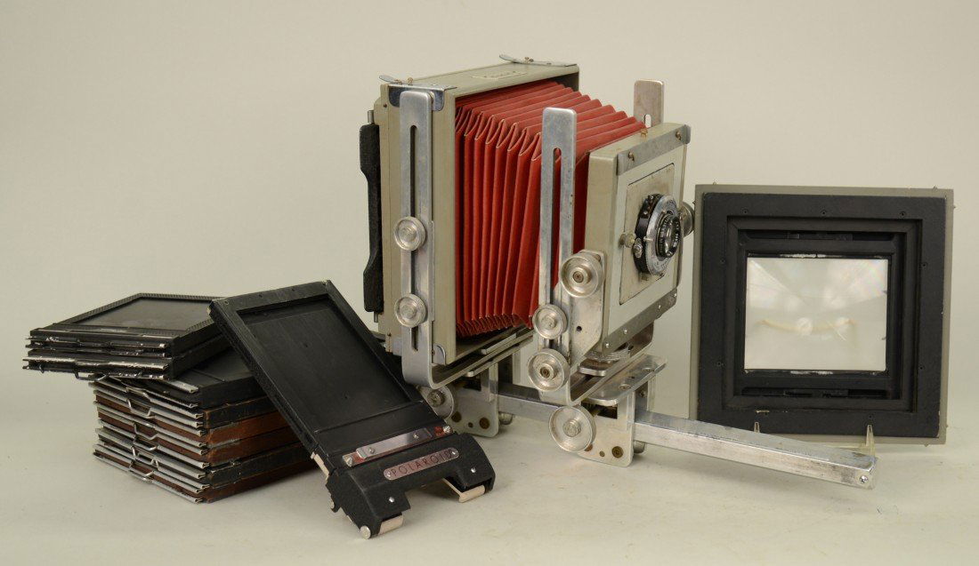 BURKE & JAMES BELLOWS CAMERA, with Kodak Supermatic Shu: BURKE & JAMES BELLOWS CAMERA, with Kodak Supermatic Shutter Lens and additional camera slides; in fitted box; height: 22 inches