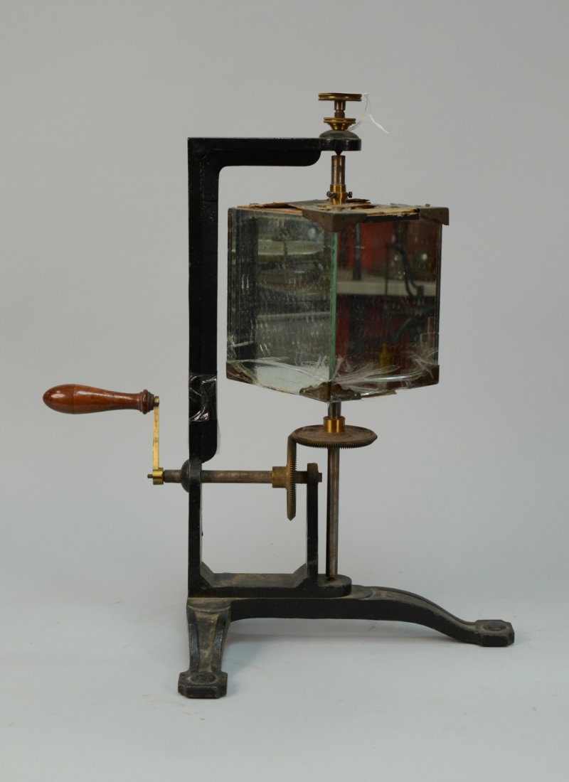 HAND CRANKED MIRRORED SOUND AND LIGHT REFLECTOR DEVICE,: HAND CRANKED MIRRORED SOUND AND LIGHT REFLECTOR DEVICE, with cast iron base; height: 22 1/2 inches