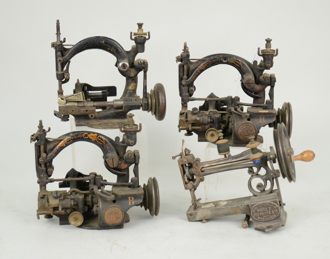 THREE CAST IRON SEWING MACHINES, marked Anita, together: THREE CAST IRON SEWING MACHINES, marked Anita, together with a French sewing machine
