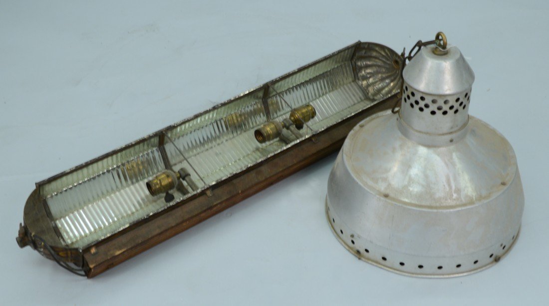 TWO MIRRORED LIGHTING FIXTURES; one stamped Klemm & Co.: TWO MIRRORED LIGHTING FIXTURES; one stamped Klemm & Co., Philadelphia; length of longer: 36 inches