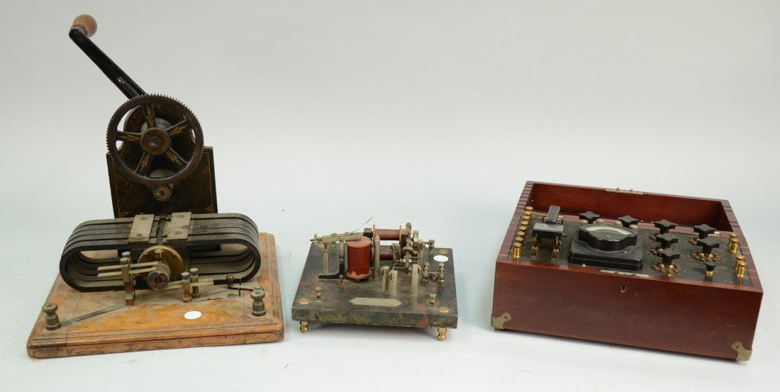 THREE ELECTRICAL INSTRUMENTS, including a Warner Pole C: THREE ELECTRICAL INSTRUMENTS, including a Warner Pole Changer, Warner Electric Company, maker; Western Ammeter, signed Herman A. Holz, New York; Electric Generator