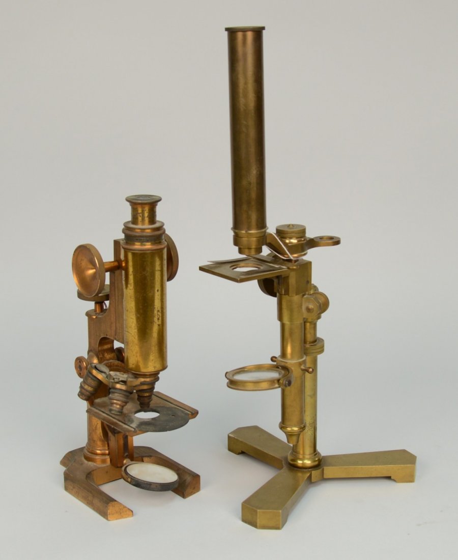 TWO MICROSCOPES; one marked made by C & A Spencer, Cana: TWO MICROSCOPES; one marked made by C & A Spencer, Canastota, New York; and one marked L. Schrauer, maker, New York; height of tallest: 19 inches