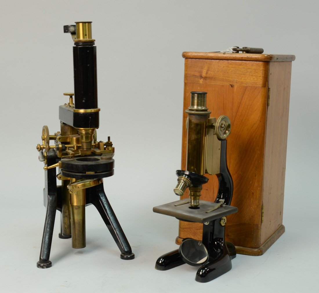 TWO MICROSCOPES: TWO MICROSCOPES, one marked Bausch & Lomb Optical Co., in fitted box; with an unmarked "one-off" microscope, with wooden tripod base; height: 19 inches