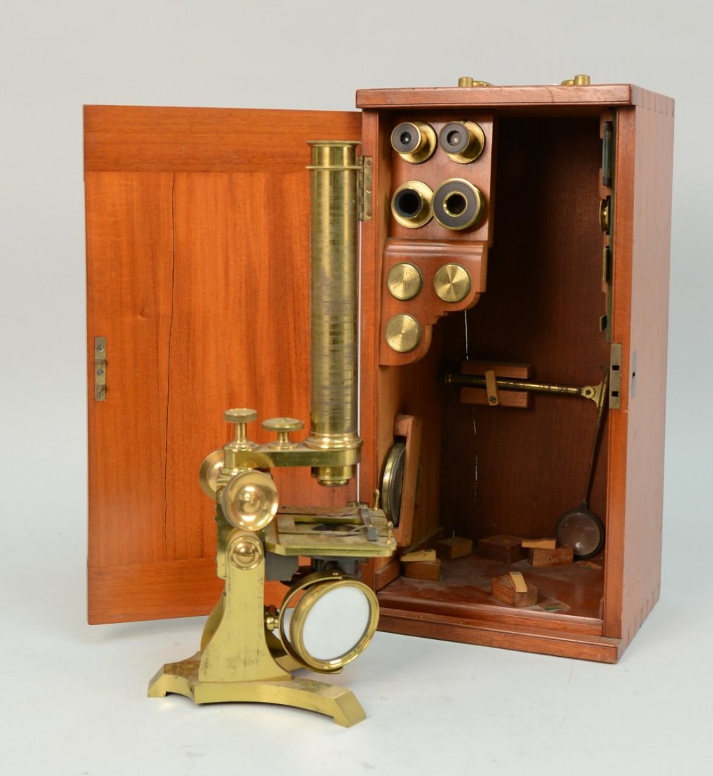 DOLLOND BRASS MICROSCOPE: DOLLOND BRASS MICROSCOPE; marked Dollond, London; in fitted box; height: 17 inches