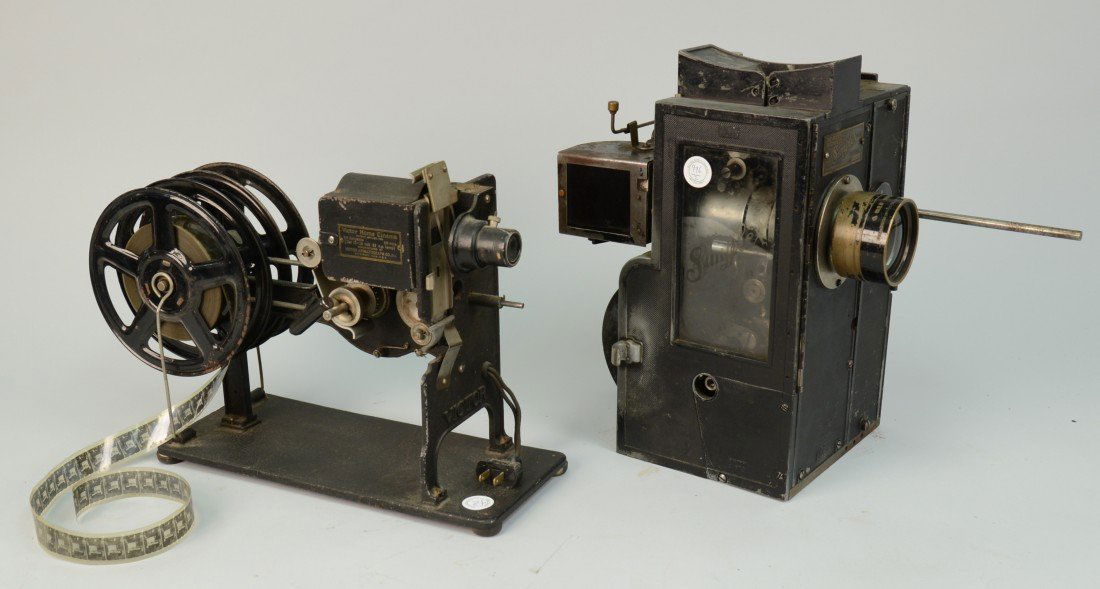 TWO MOVIE PROJECTORS, one a hand cranked Victor Home Ci: TWO MOVIE PROJECTORS, one a hand cranked Victor Home Cinema Animatograph, 28mm; and the other a Simplex