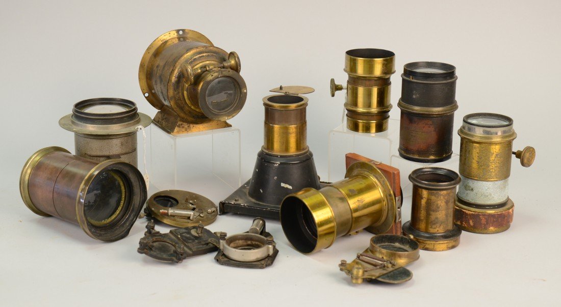 BOX LOT OF CAMERA LENSES; including makers: Dallmeyer, : BOX LOT OF CAMERA LENSES; including makers: Dallmeyer, London; Riley Bros., Bradford; E. Suter, Basel; Darlot, Paris; James W. Queen & Co., Philadelphia; and others