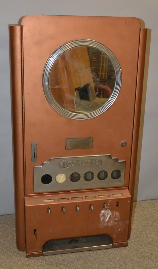 ART DECO METAL MIRRORED COIN-OP CIGARETTE MACHINE; heig: ART DECO METAL MIRRORED COIN-OP CIGARETTE MACHINE; height: 39 inches; width: 20; depth: 9 1/2 inches