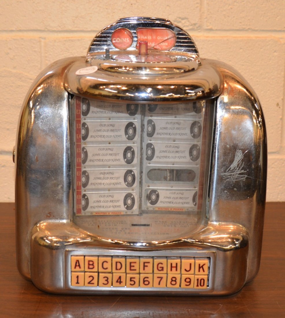 TABLE TOP COIN OPERATED CHROME DINER JUKE BOX, Seeburg : TABLE TOP COIN OPERATED CHROME DINER JUKE BOX, Seeburg Co, Chicago, IL; height: 12 inches