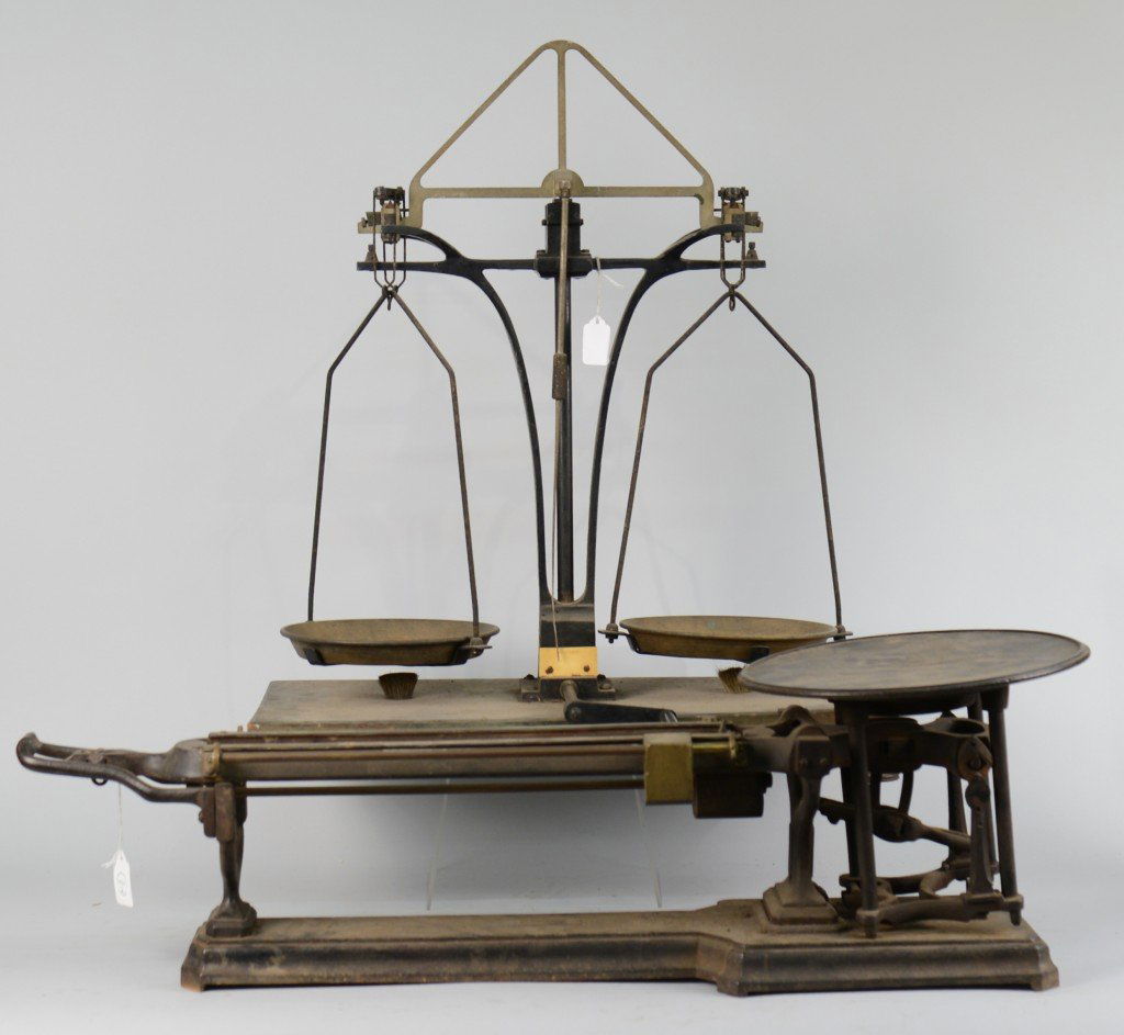 TRIPLE BALANCE CAST IRON SCALE, Henry Troener, PA; heig: TRIPLE BALANCE CAST IRON SCALE, Henry Troener, PA; height: 9 inches; together with a BEAM BALANCE SCALE, made in Germany; height: 25 inches