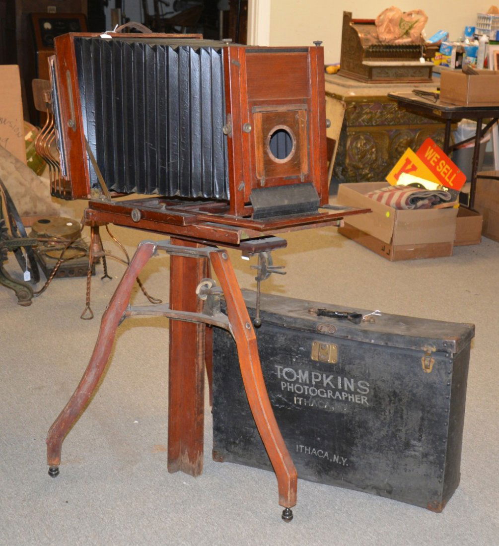 BELLOWS BOX CAMERA, Thomkins Photographer, Ithaca, NY; : BELLOWS BOX CAMERA, Thomkins Photographer, Ithaca, NY; with carrying case and three negative plates; length: 31 inches; height: 16 inches; together with a TRIPOD CAMERA STAND