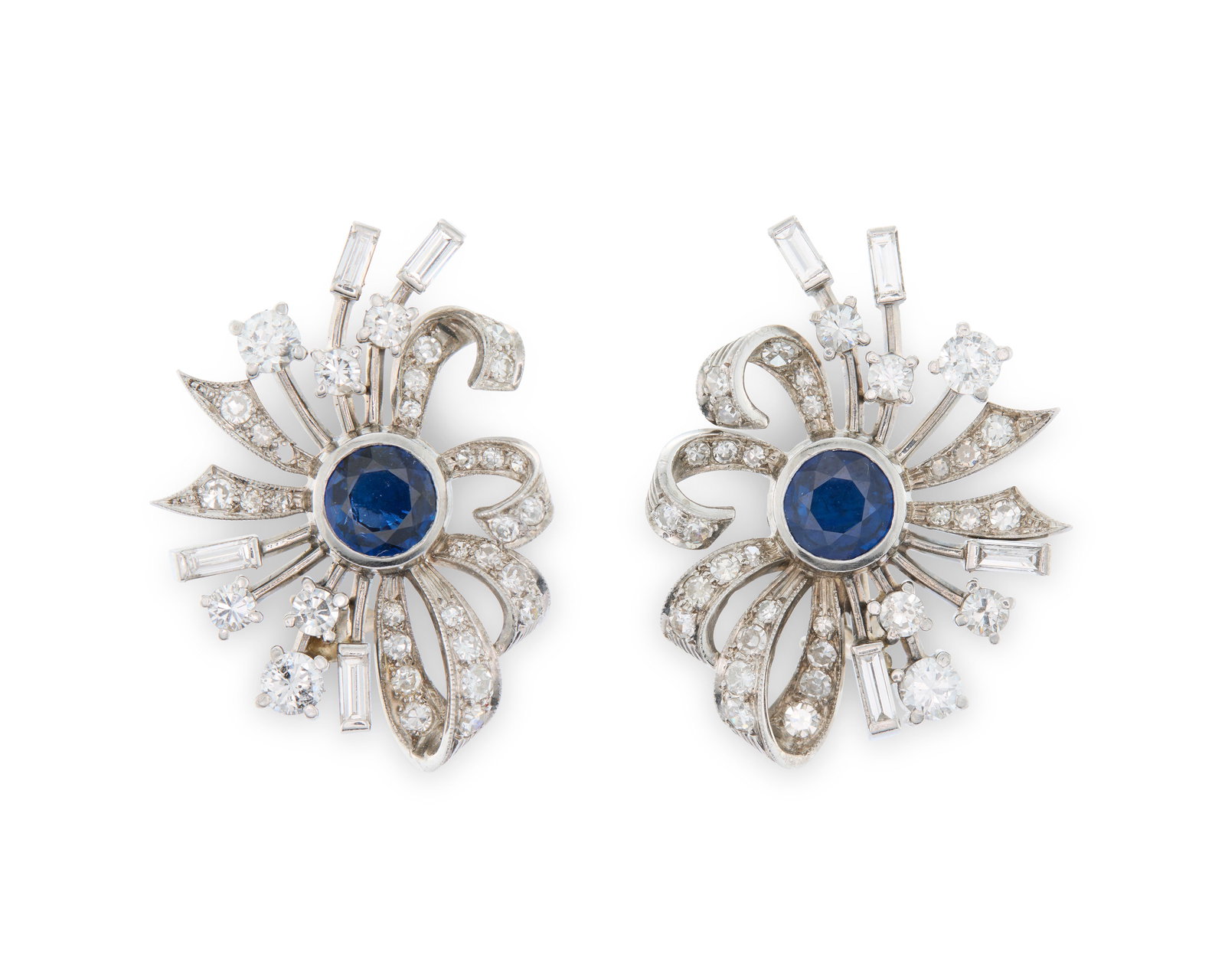 Platinum, Sapphire, and Diamond Earrings: Platinum, Sapphire, and Diamond Earrings the spray- and bouquet-form earrings each centering a bezel-set circle-cut sapphire weighing approx. 1.00 ct. framed by baguette-, full-, and single-cut