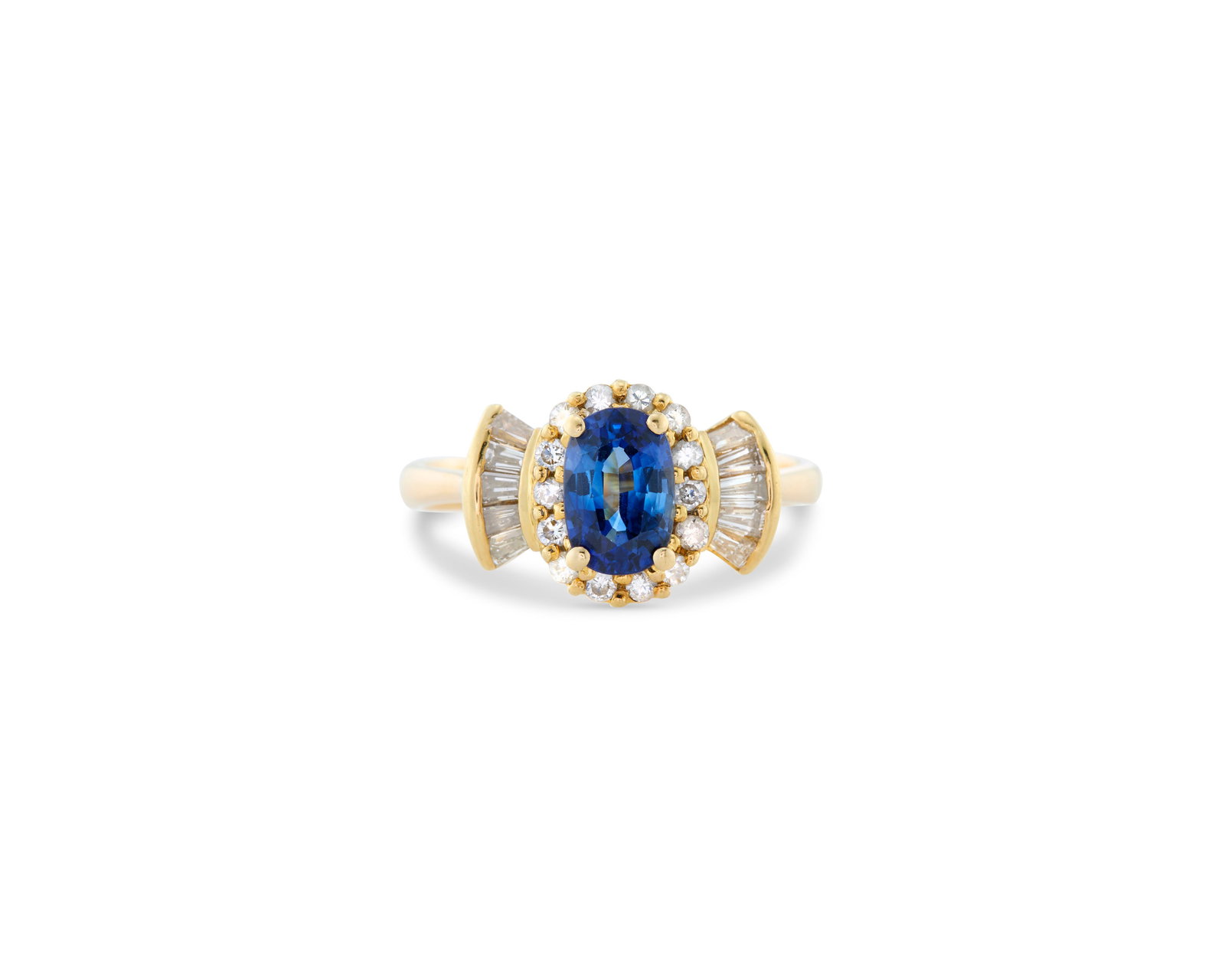 18K Gold, Sapphire, and Diamond Ring: 18K Gold, Sapphire, and Diamond Ringcentering an oval-cut sapphire weighing approx. 1.30 cts. framed by full-cut diamonds further flanked by baguette-cut diamonds; diamonds weighing approx. 0.50 tcw.;