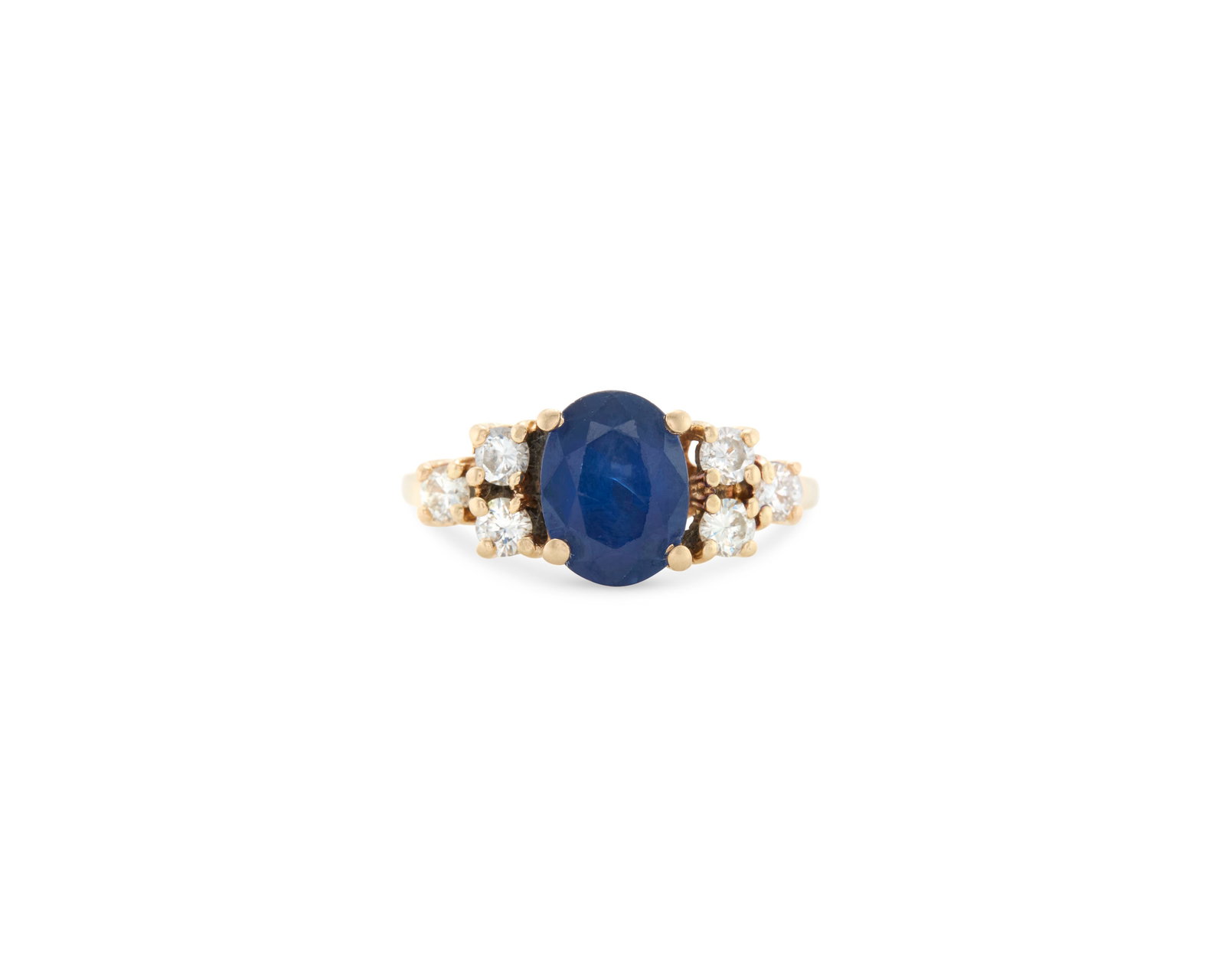 14K Gold, Sapphire, and Diamond Ring: 14K Gold, Sapphire, and Diamond Ringprong-set centering an oval-cut sapphire weighing approx. 1.70 cts. framed by six full-cut diamonds weighing approx. 0.30 tcw.; 2.20 dwts.; size 7Provenance: The Co