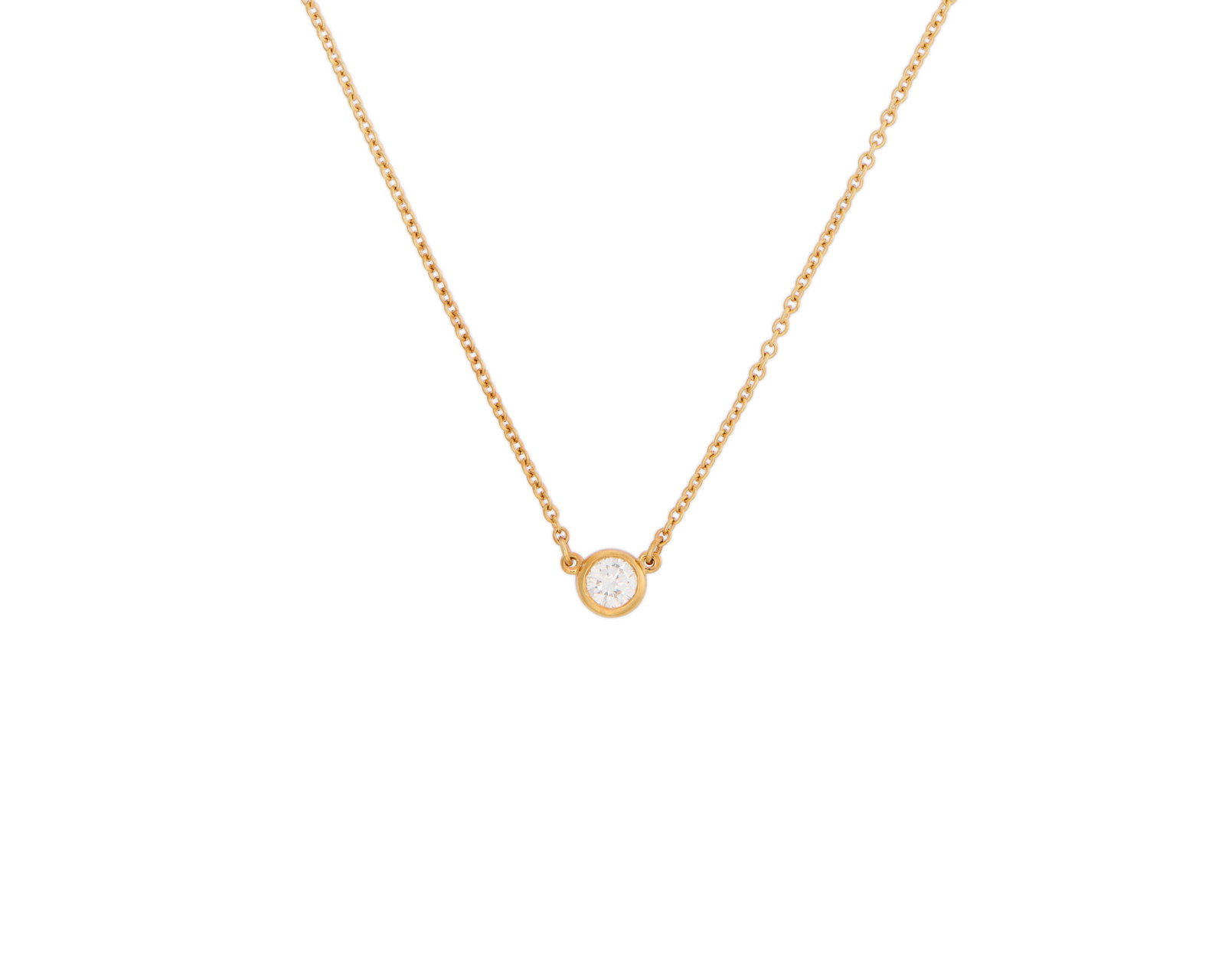 TIFFANY & CO., ELSA PERETTI 18K Gold and Diamond 'Diamonds by the Yard' Necklace: TIFFANY & CO., ELSA PERETTI 18K Gold and Diamond 'Diamonds by the Yard' Necklace featuring a bezel-set round brilliant-cut diamond weighing approx. 0.20 ct. suspended from a fine-link chain; signed