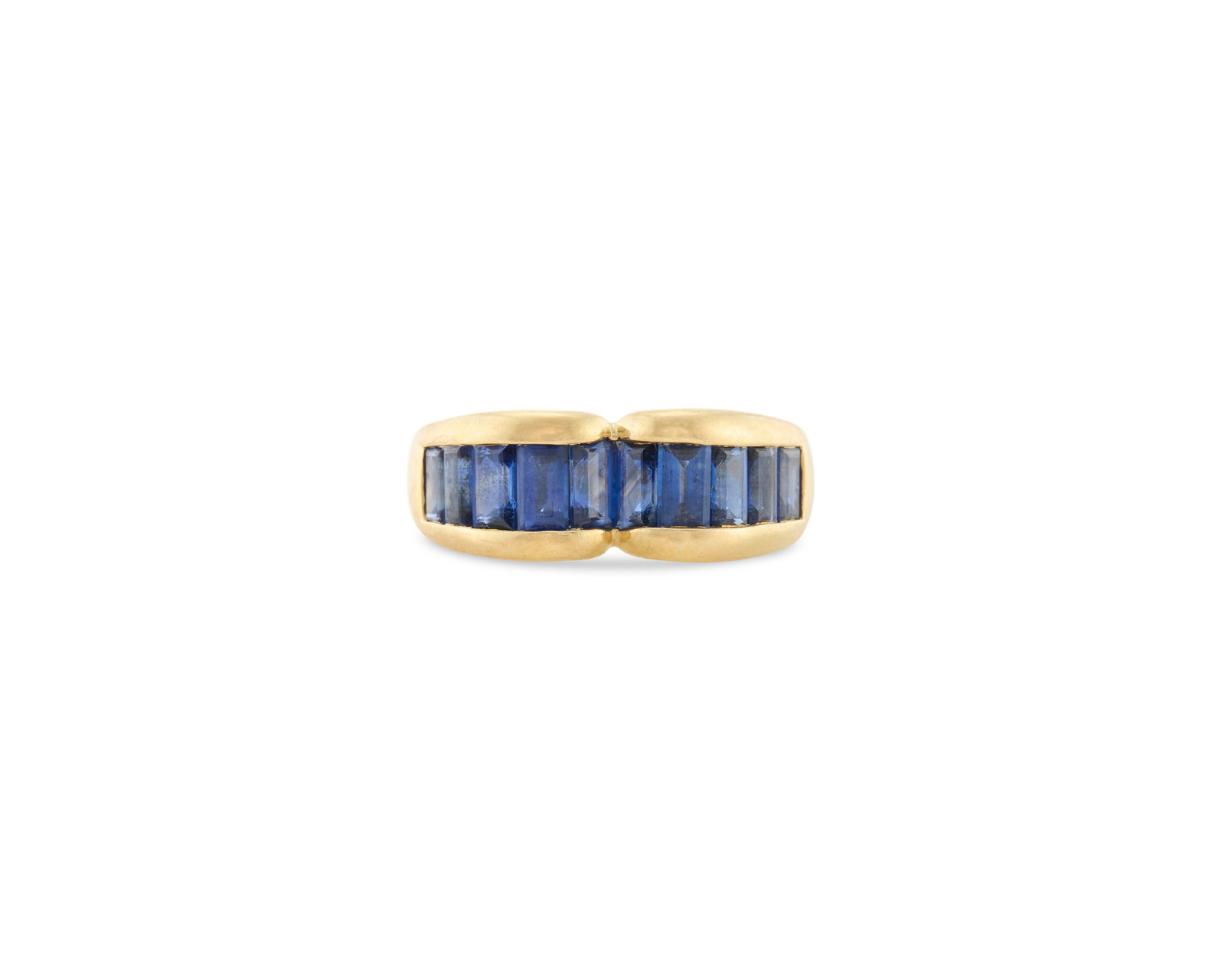 18K Gold and Sapphire Ring: 18K Gold and Sapphire Ring the heart-shaped ring featuring channel-set baguette-cut sapphires weighing approx. 1.80 tcw. within a polished gold mount; 3.53 dwts.; size 6 3/4