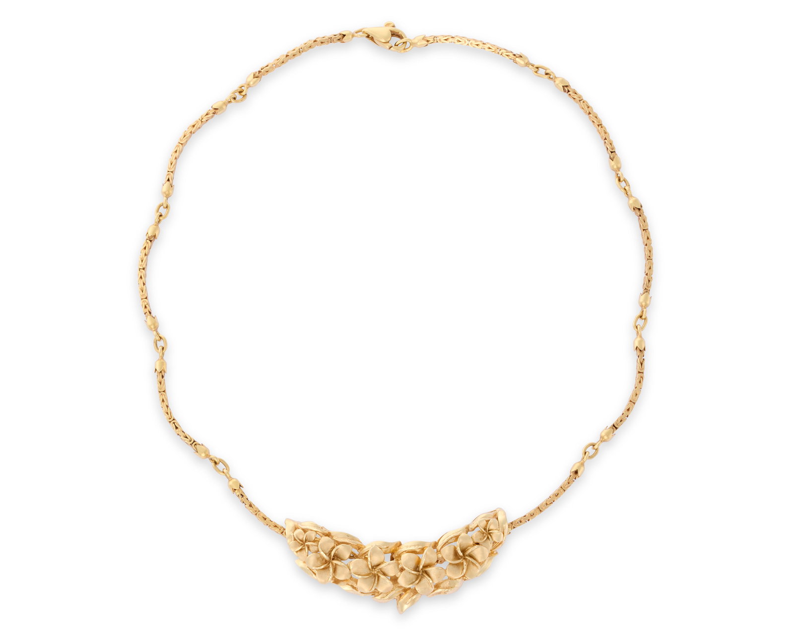 14K Gold Necklace: 14K Gold Necklace of Byzantine-style links suspending a central plaque of textured and polished yellow gold flowers; 15.19 dwts.; lg. 15 in.