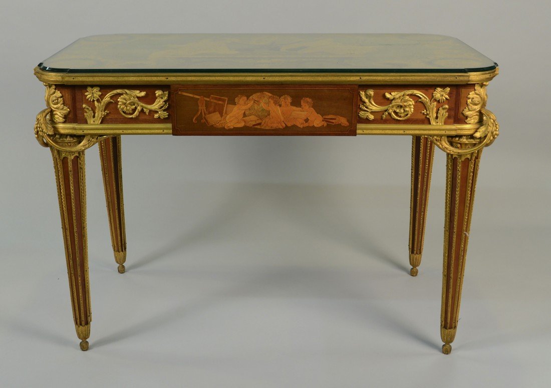 LOUIS XVI MARQUETRY INLAID ORMOLU MOUNTED TABLE DES MUS: LOUIS XVI MARQUETRY INLAID ORMOLU MOUNTED TABLE DES MUSES, circa 1870; in the manner of Alfred-Emmanuel-Louis Beurdeley; with an elaborate marquetry inlaid and stained top representing the mythologica