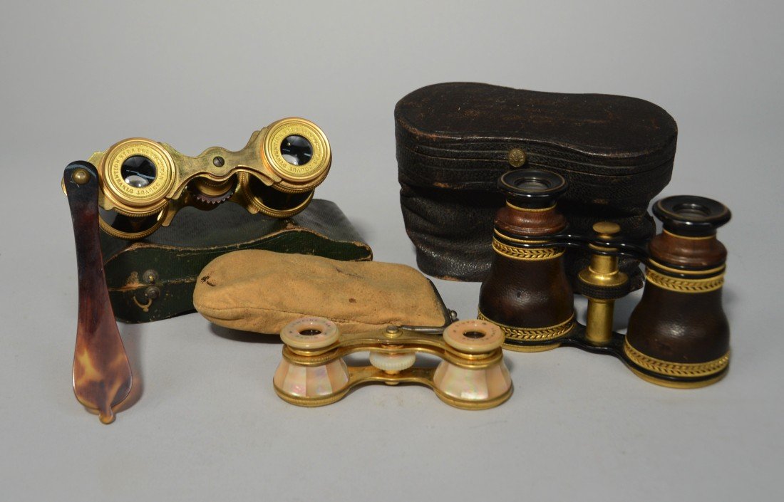 THREE PAIR OPERA GLASSES;: THREE PAIR OPERA GLASSES; including: one mother of pearl, one leather and one tortoiseshell