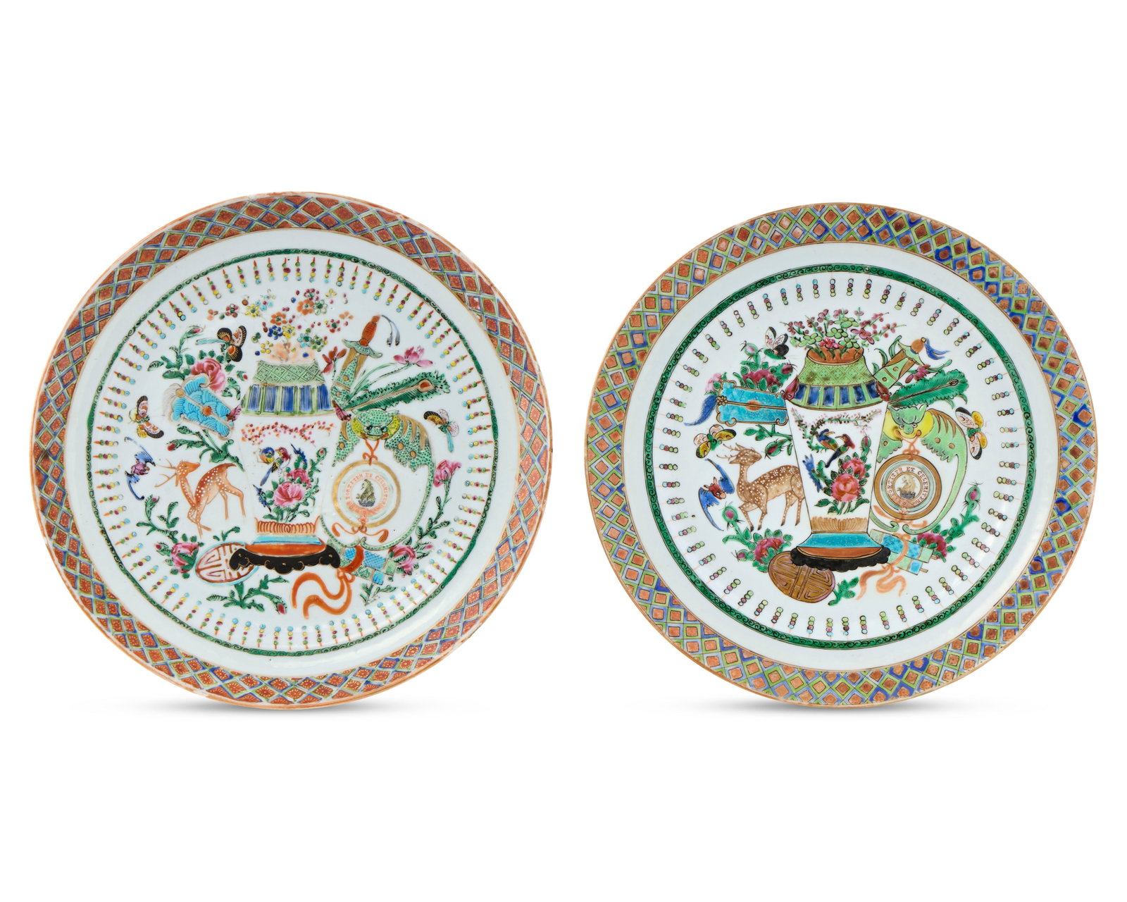 Very Rare Pair of Chinese Export Swedish Market Armorial Plates: Very Rare Pair of Chinese Export Swedish Market Armorial Plates ca. 1910; bearing the KEILLER crest inscribed with the motto FORTITER ET CELERITER; decorated with polychrome harlequin diaper border an