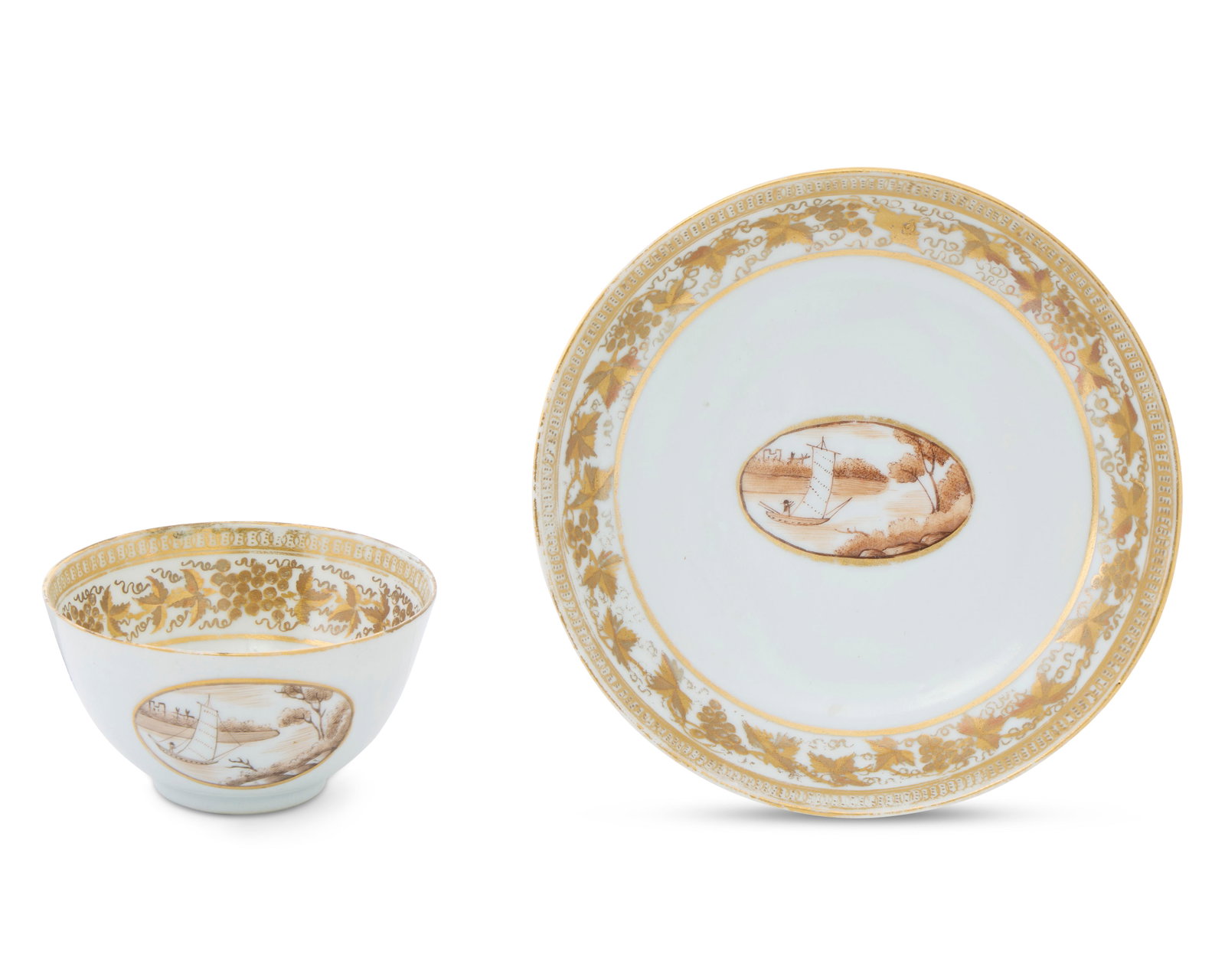 American Market Tea Bowl and Saucer, likely a New Haven, Connecticut order: American Market Tea Bowl and Saucer, likely a New Haven, Connecticut order ca. 1800-1810; depicting in the roundel depicting a sepia sailing ship in a landscape and decorated with gilt grapevine borde