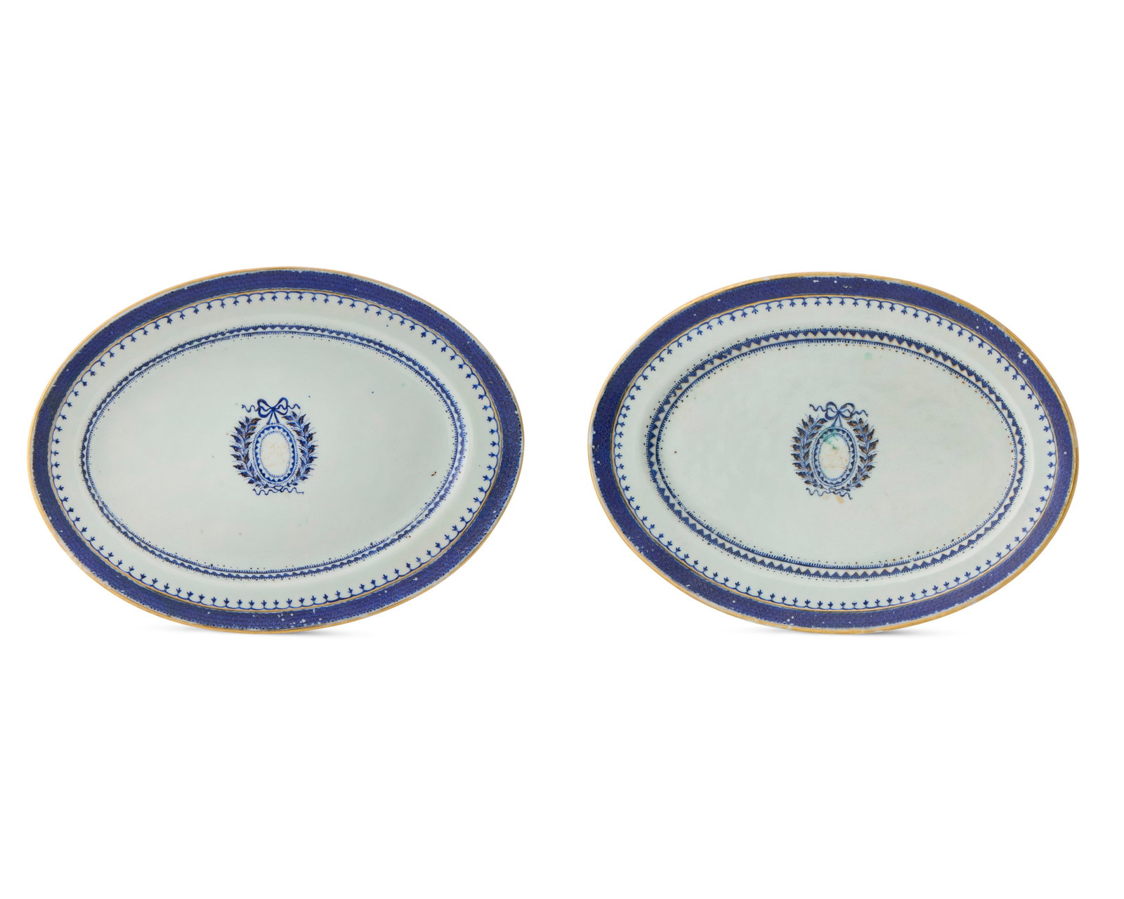 Pair of Chinese Export American Market Oval Platters, likely for the Lewis Family, Philadelphia,: Pair of Chinese Export American Market Oval Platters, likely for the Lewis Family, Philadelphia, Pennsylvania ca. 1796-1800; bearing a central laurel wreath inscribed with the gilt monogram SL; decora