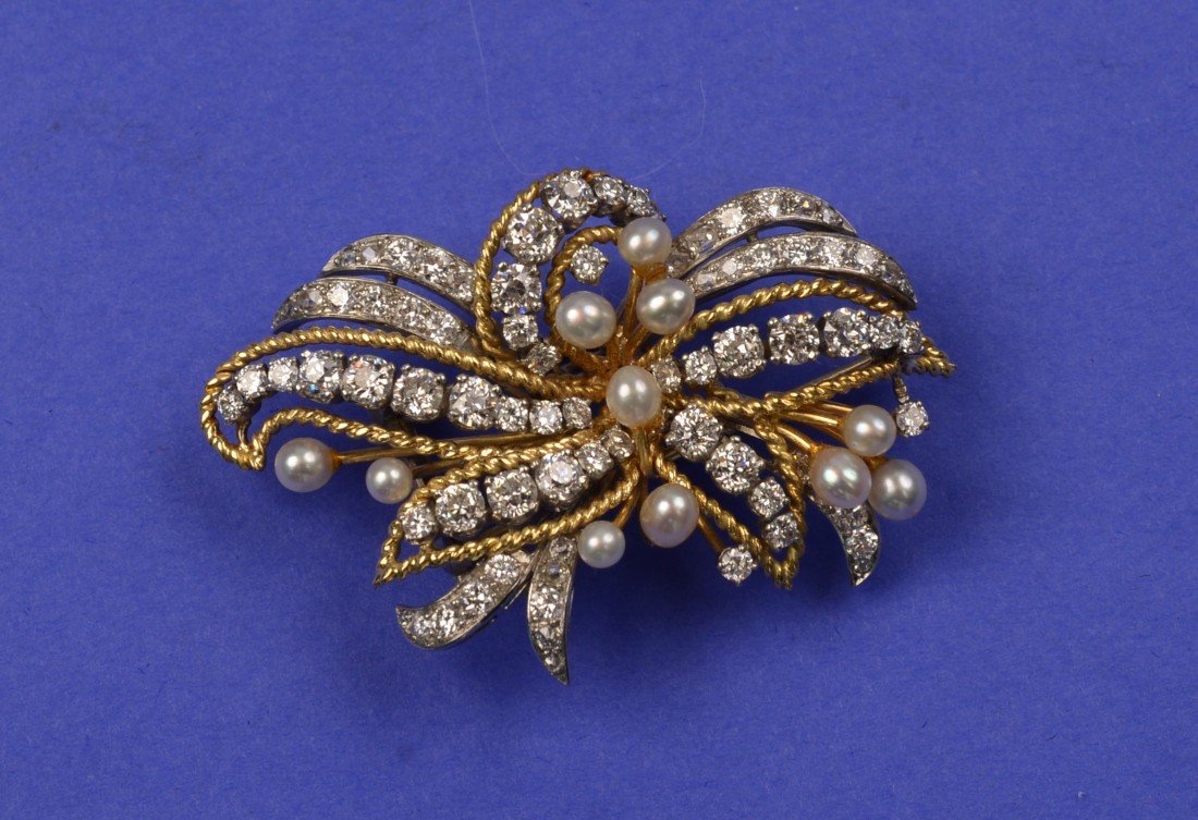 PLATINUM, 18K YELLOW GOLD, DIAMOND, AND PEARL BROOCH,: PLATINUM, 18K YELLOW GOLD, DIAMOND, AND PEARL BROOCH, Raymond Yard set with full-cut diamonds and diamond mêlée, total diamond weight approx. 4.25 cts., further set with eleven pearls; signed YARD; 