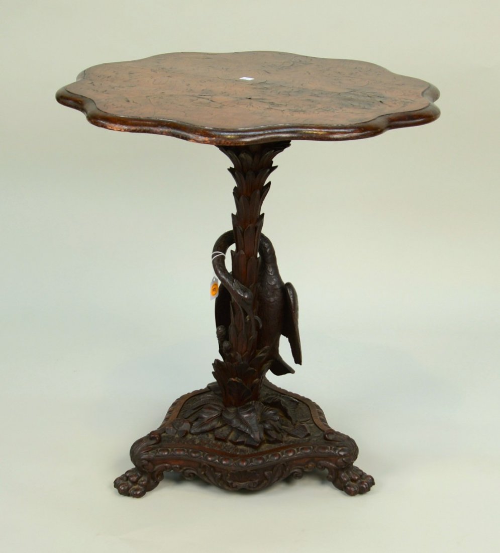 BLACK FOREST CARVED WOOD PARLOR TABLE, circa 1900;: BLACK FOREST CARVED WOOD PARLOR TABLE, circa 1900; with carved egret catching a fish; height: 30 inches; diameter: 27 inches