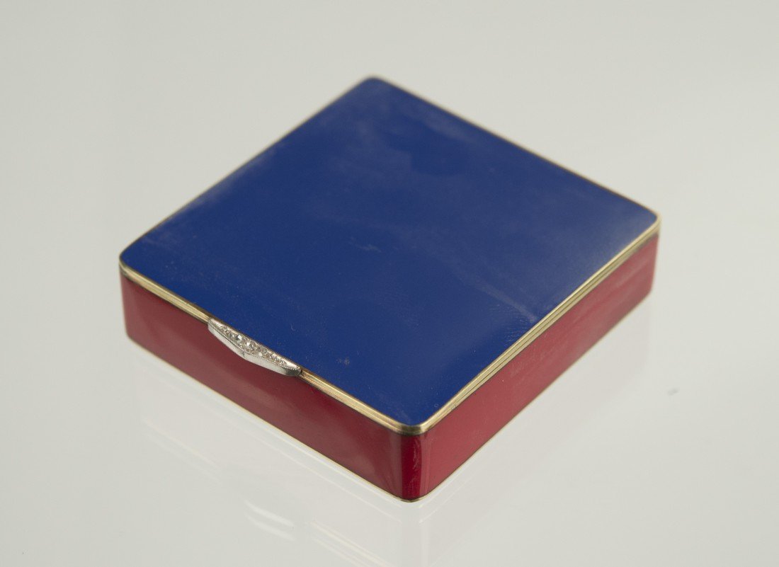 14K YELLOW GOLD, ENAMEL, AND DIAMOND CLASP COMPACT: in a fitted suede sleeve marked Raymond Yard; gross weight: 58 dwts.; 1 7/8 x 1 3/4 x 1/2 in.