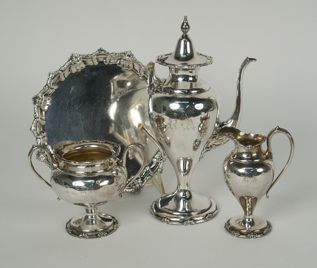 AMERICAN SILVER THREE PIECE COFFEE SERVICE: AMERICAN SILVER THREE PIECE COFFEE SERVICE marked Sterling; the coffee pot with weighted base; together with a SILVER TRAY, Crichton Brothers, maker, diameter: 8 in.; total weighable silver: 21 ozs.