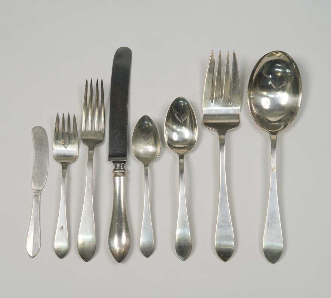 AMERICAN SILVER FLATWARE SERVICE, Dominick & Haff: AMERICAN SILVER FLATWARE SERVICE, Dominick & Haff, comprising: 12 dinner forks, 12 salad forks, 12 table spoons, 7 tea spoons, 7 butter knives, 12 dinner knives, salad servers and a cake slice; total