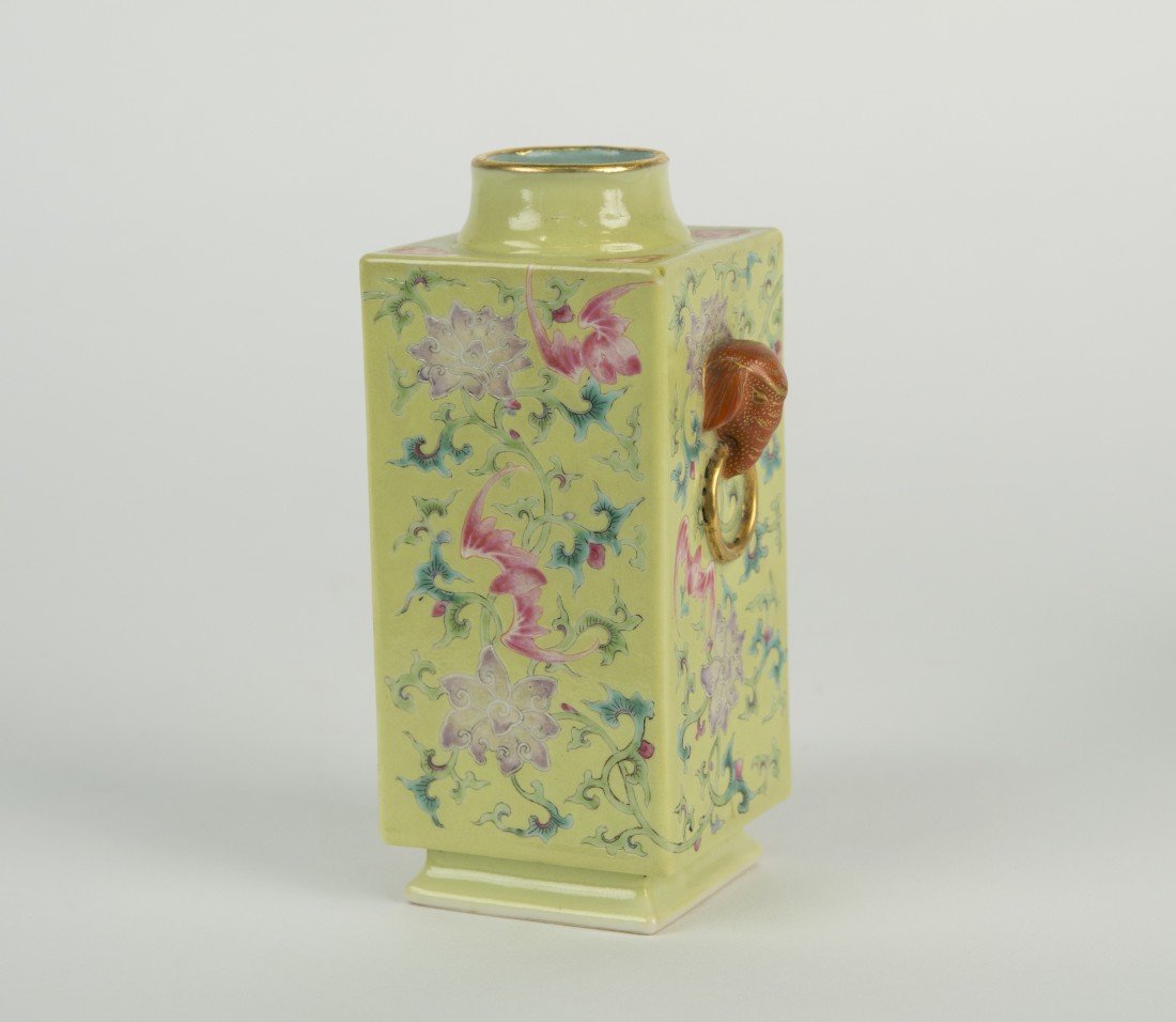 CHINESE YELLOW GROUND SQUARE VASE;: CHINESE YELLOW GROUND SQUARE VASE; with elephant ring handles and bat decoration and bearing reign mark on base; height: 5 in.