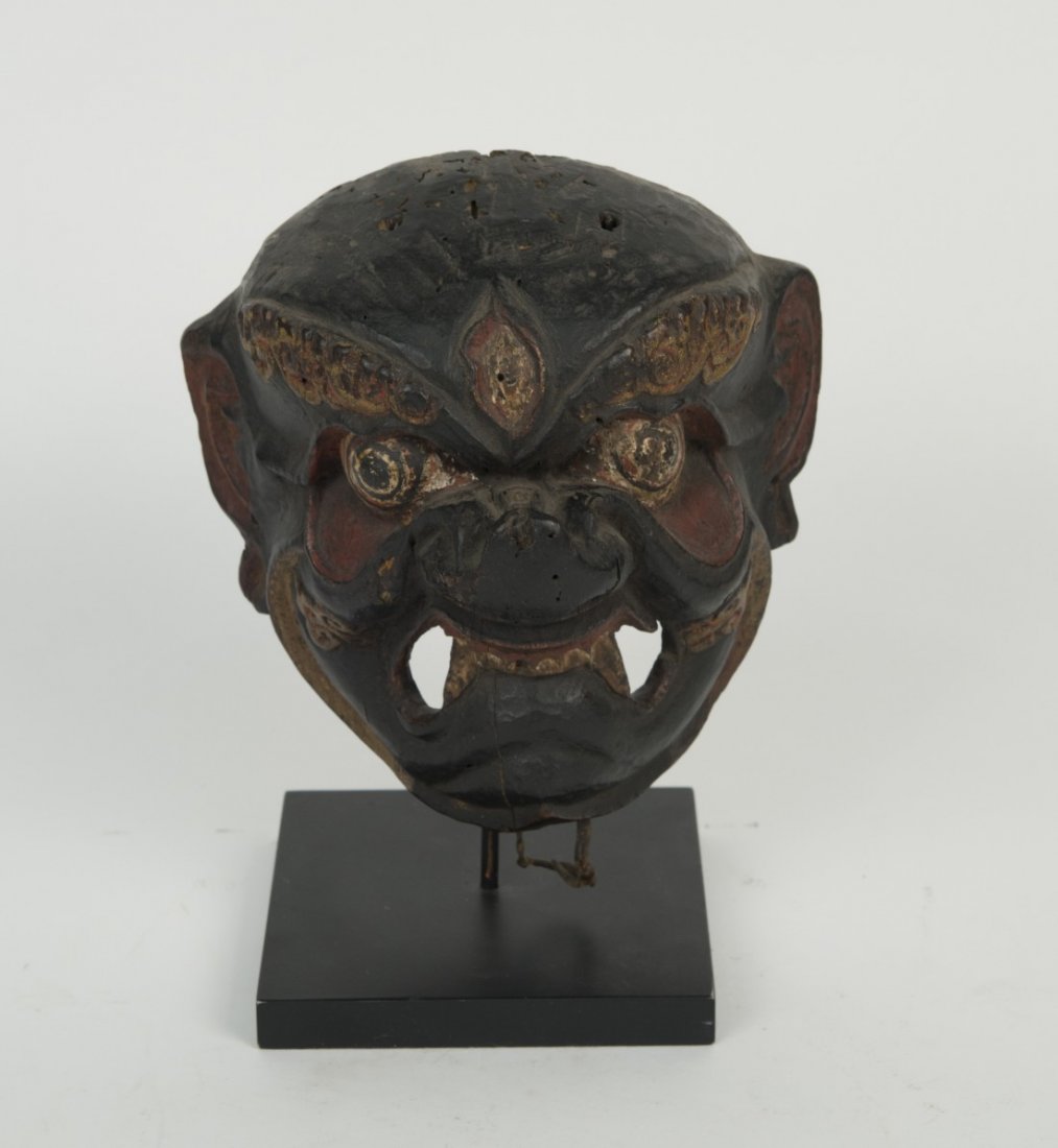 INDONESIAN CARVED AND PAINTED WOOD CEREMONIAL MASK;: INDONESIAN CARVED AND PAINTED WOOD CEREMONIAL MASK;height: 9 in. Property of a New York City family.