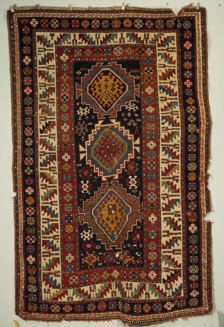 KAZAK RUG, Caucasus, ca. 1900;: KAZAK RUG, Caucasus, ca. 1900; 7 ft. 7 in. x 4 ft. 10 in. Provenance: Collection of Grover Schiltz, Chicago, IL