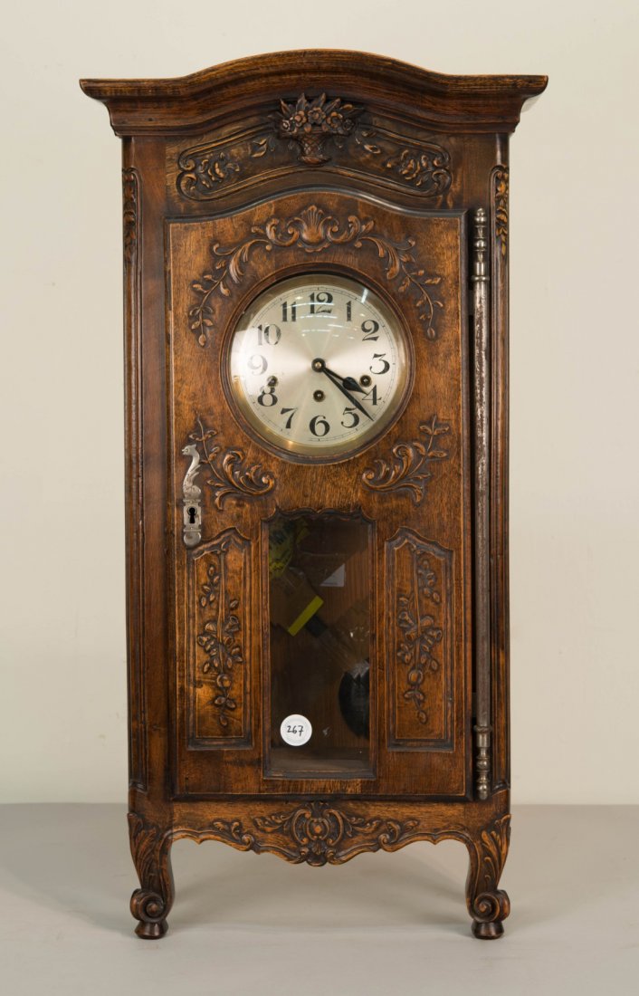 LOUIS XV STYLE CARVED WALNUT SHELF CLOCK;: LOUIS XV STYLE CARVED WALNUT SHELF CLOCK; height: 29 in., width: 36 in.