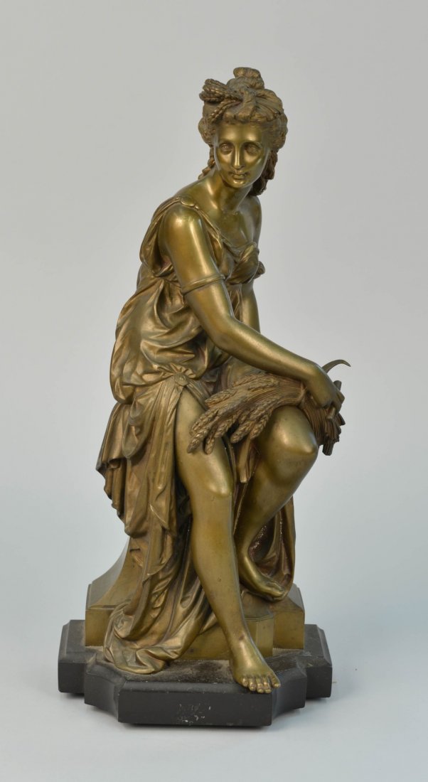 CONTINENTAL PATINATED BRONZE FIGURE OF A WOMAN;: CONTINENTAL PATINATED BRONZE FIGURE OF A CLASSICAL WOMAN; holding a sheath of wheat and a sickle; height: 17 in.