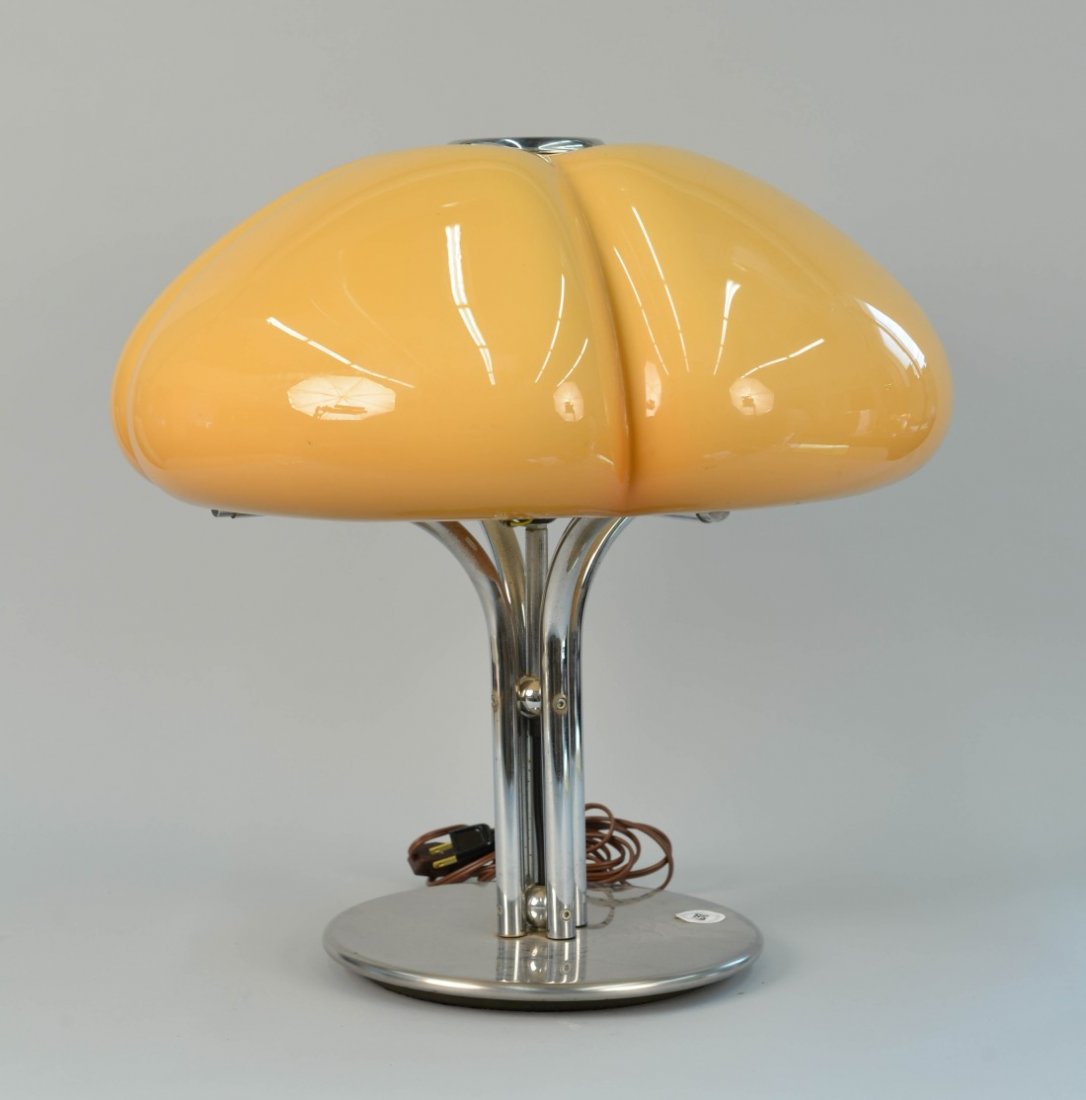 MID CENTURY ITALIAN QUADRIFOGLIO ART 4000 TABLE LAMP: MID CENTURY ITALIAN QUADRIFOGLIO ART 4000 TABLE LAMP, by Gae Aulenti for Guzzini; biomorphic plastic shade on a chrome base, ca. 1970; height: 20 1/2 in. Note: This lamp was recently used as a prop in