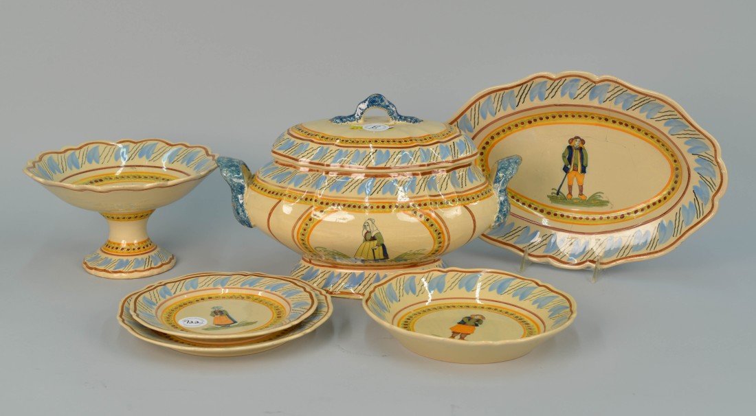 QUIMPER PORCELAIN PARTIAL DINNER SERVICE: QUIMPER PORCELAIN PARTIAL DINNER SERVICE; marked Henroit, Quimper; comprising 22 plates, diameter: 9 1/2 in.; 12 shallow bowls, diameter: 9 in.; 10 luncheon plates, diameter: 8 1/4 in.; tray, length: 
