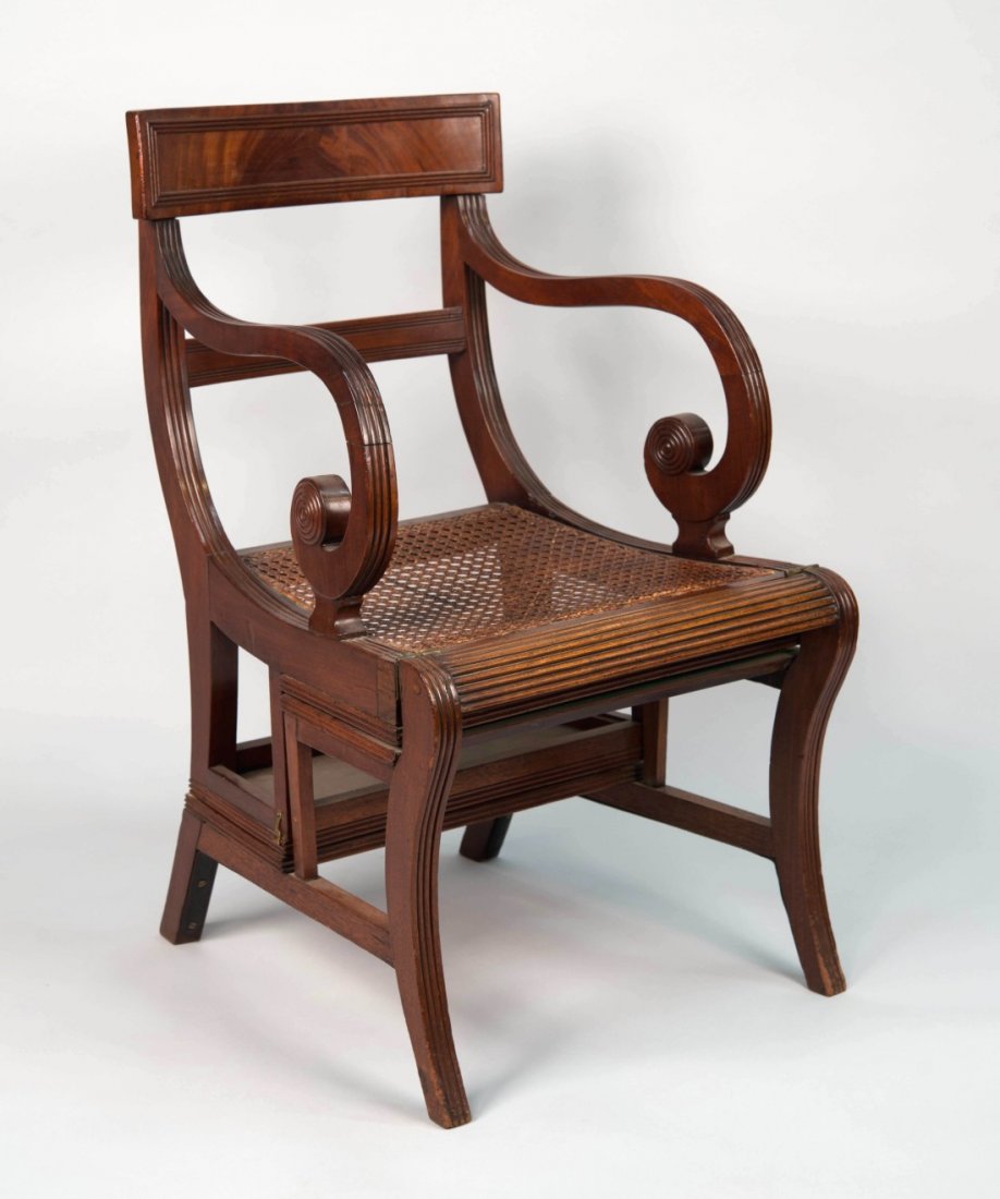 REGENCY MAHOGANY CANED SEAT METAMORPHIC LIBRARY: REGENCY MAHOGANY CANED SEAT METAMORPHIC LIBRARY ARMCHAIR, early 19th century;