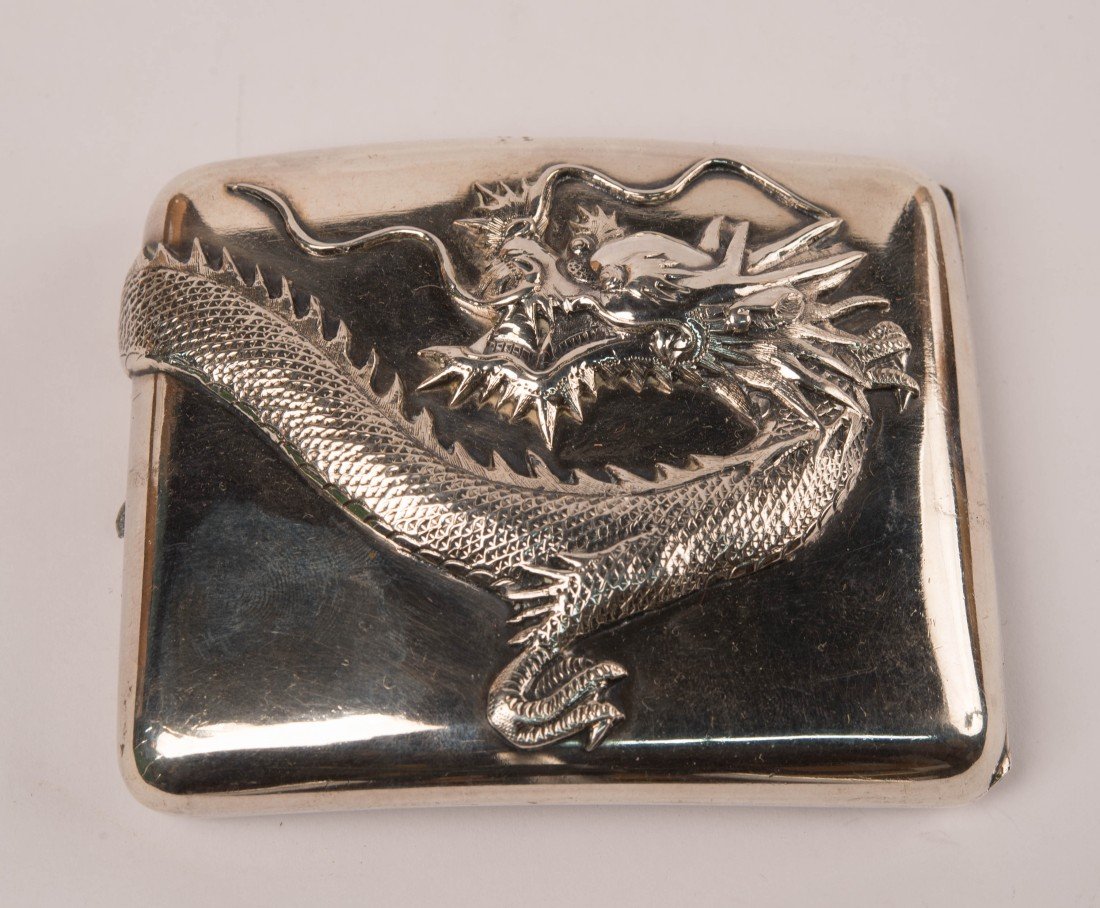 CHINESE SILVER DRAGON DECORATED CIGARETTE CASE;: CHINESE SILVER DRAGON DECORATED CIGARETTE CASE; makers mark WSL ; length: 3 3/4 in.; weight: 6.2 ozs. Provenance: Waddington Auctions, Toronto, Canada