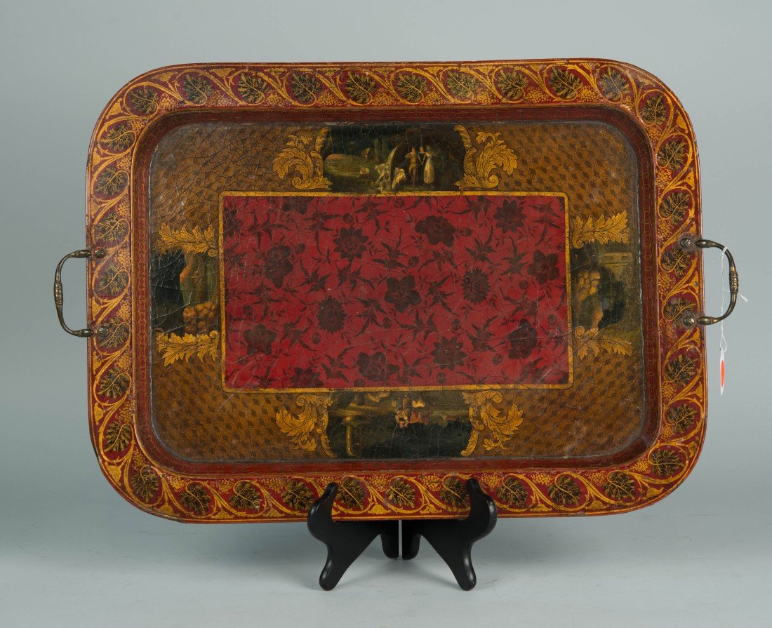 VICTORIAN RED, BLACK AND GILT DECORATED JAPANNED PAPIER: VICTORIAN RED, BLACK AND GILT DECORATED JAPANNED PAPIER MACHE TWO HANDLED TRAY, 19th century; 22 x 16 1/2 in.