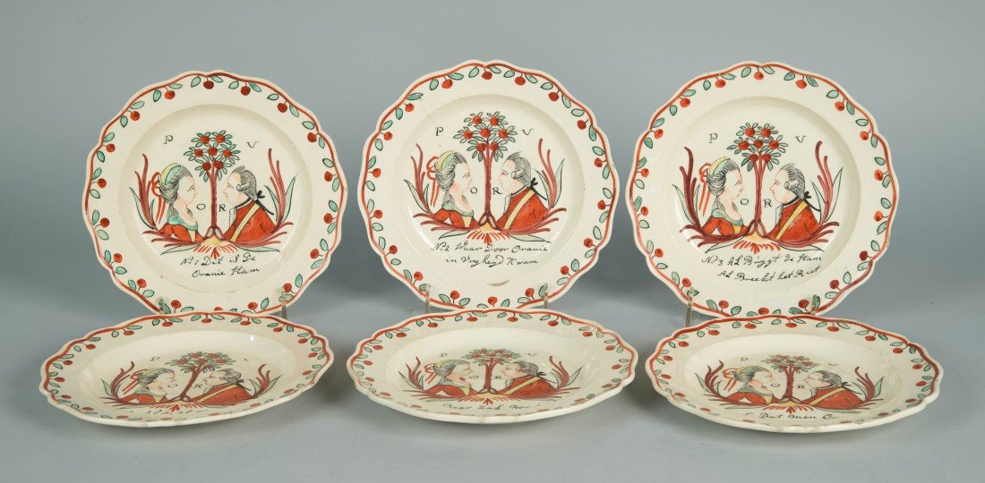 SET OF SIX DUTCH DECORATED ENGLISH CREAMWARE SCALLOPED: SET OF SIX DUTCH DECORATED ENGLISH CREAMWARE SCALLOPED EDGE PLATES, 18th century; depicting Princess Wilhelmina and Prince William V of Orange with Dutch verses; diameter: 8 in.