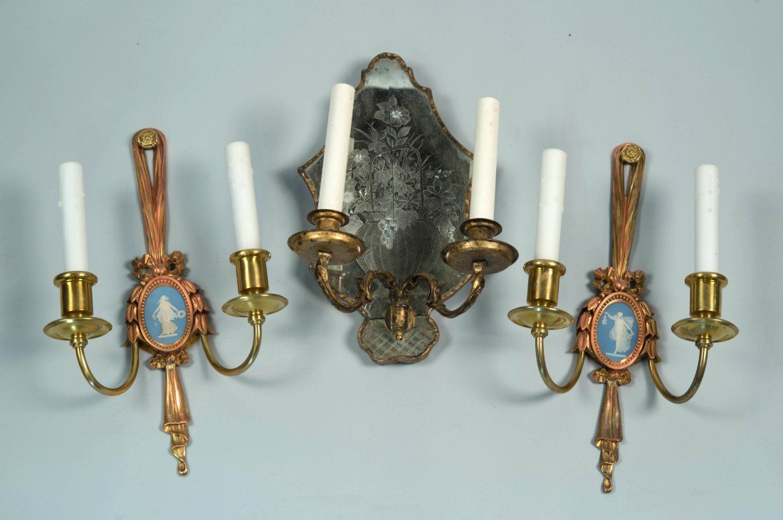 PAIR OF GILT BRONZE AND WEDGWOOD PLAQUE TWO LIGHT WALL: PAIR OF GILT BRONZE AND WEDGWOOD PLAQUE TWO LIGHT WALL SCONCES, Caldewell, maker; bearing Caldwell mark; height: 15 in.; together with a CONTINENTAL MIRRORED TWO LIGHT WALL SCONCE, height: 13 1/4 in.