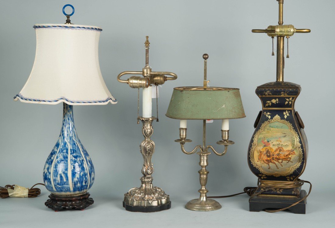 COLLECTION OF FOUR CONTINENTAL LAMPS;: COLLECTION OF FOUR CONTINENTAL LAMPS; comprising: a tole peinte example, height overall: 29 in.; a silvered candlestick lamp, height: 22 in.; a blue and white "ikat style" bottle vase lamp, height: 24
