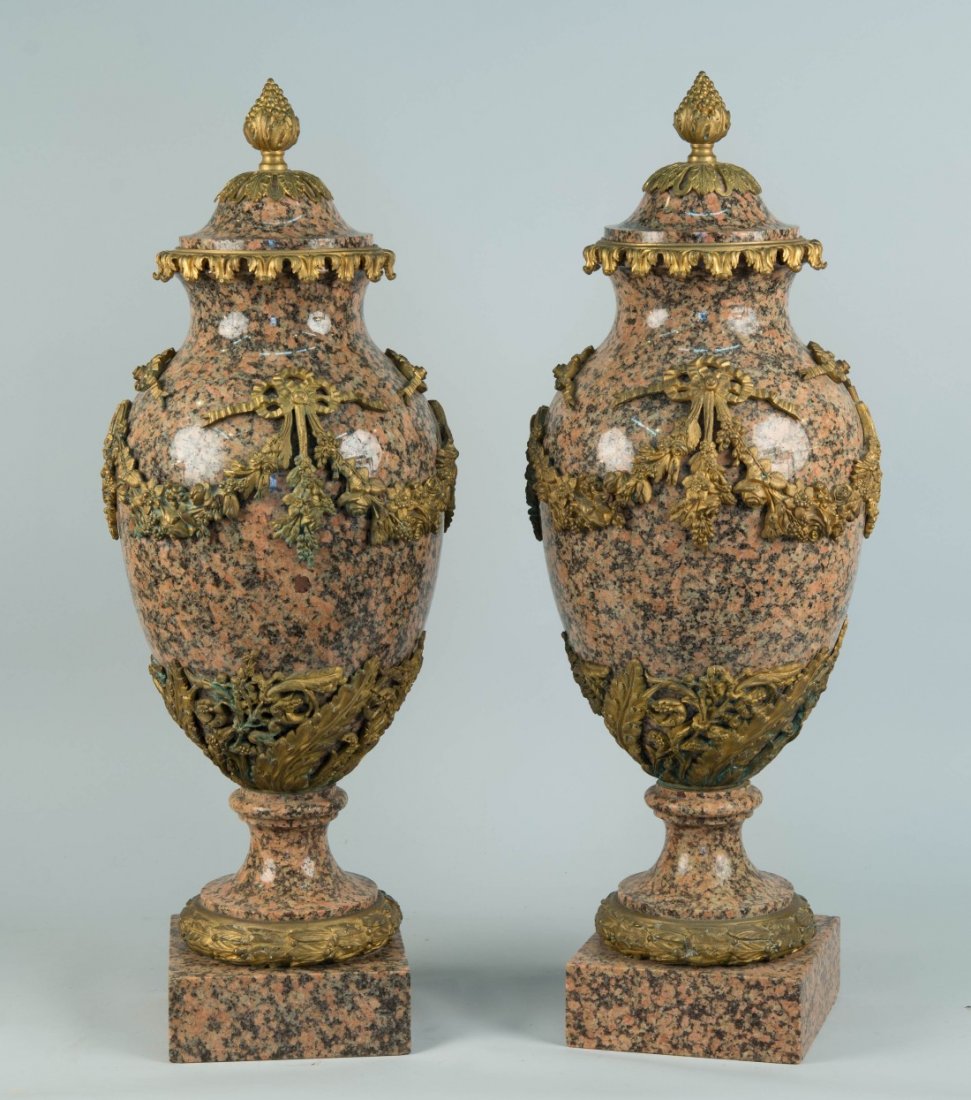 PAIR OF CONTINENTAL CARVED HARDSTONE NEOCLASSICAL: PAIR OF CONTINENTAL CARVED HARDSTONE NEOCLASSICAL ORMOLU MOUNTED COVERED VASES, early 20th century; height: 28 in. Provenance: Estate of Vincent Onorati, Newton, Massachusetts.