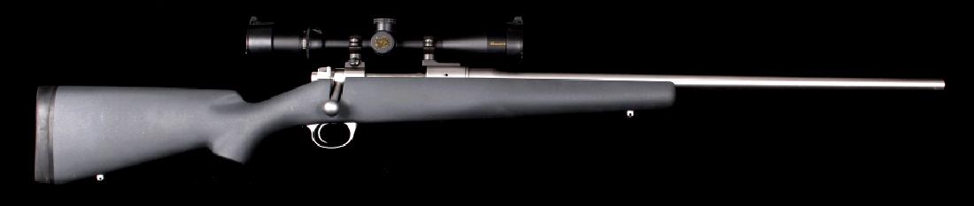 Kimber 8400 Montana 300WSM Stainless Rifle w/Scope: This is a Kimber 8400 Montana .300 WSM stainless rifle with Nikon Monarch 2.5 x 10 Scope. This rifle features a grey kevlar/carbon fiber stock, stainless steel construction, full length claw Mauser st