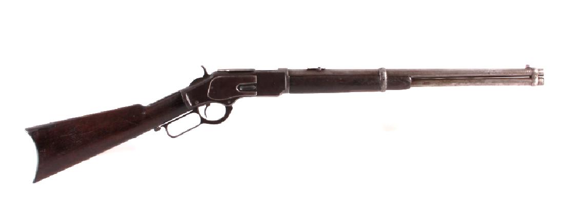Winchester Model 1873 Saddle Ring Carbine 44 Cal.: This is a wonderful Winchester Repeating Arms Model 1873 lever action with the rare Saddle Ring Carbine configuration in a .44 caliber. The carbine comes with a framed factory letter from the Cody Fir