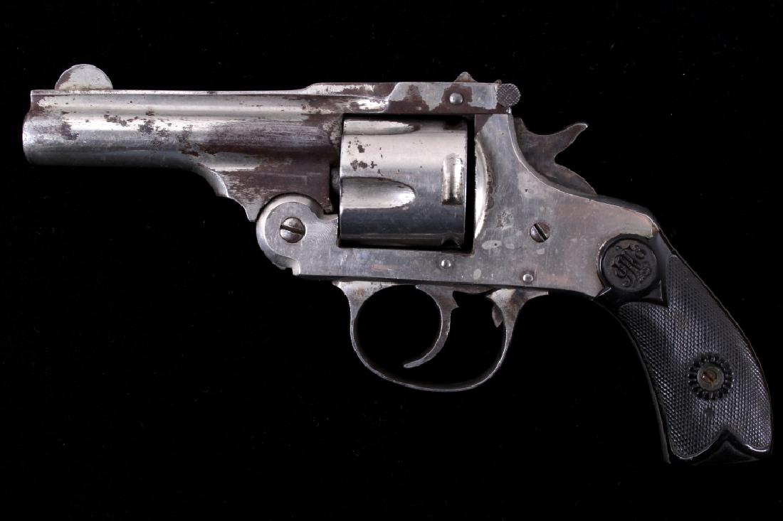 Andrew Fyrberg & Co. Double Action 38 Revolver: This is an early Andrew Fyrberg & Sons Co. Model 1903 double action top break revolver in a 38 caliber. The revolver shows a nickel finish with hard rubber original grips and a 3 1/4 inch solid rib ba