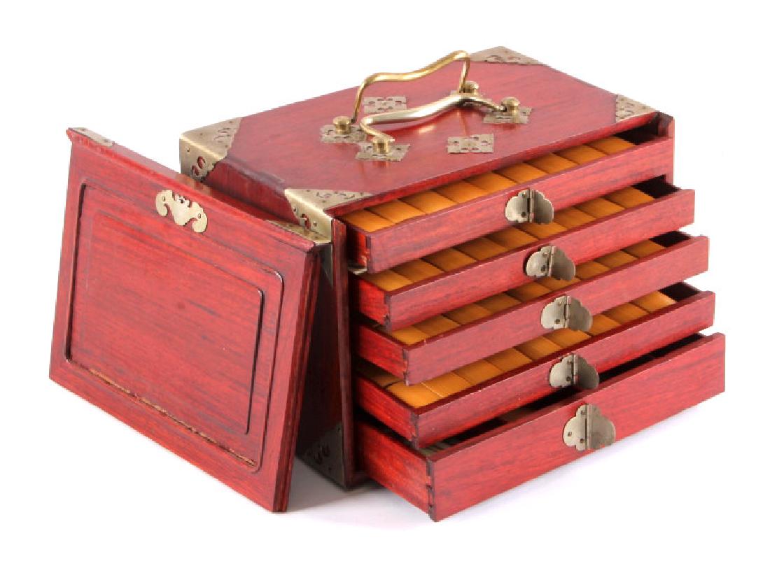 Bamboo and Bone Mahjong Set in Wooden Case: This is a bamboo and bone mahjong set in a cherry wood case. The case features 5 drawers filled with game pieces, dice, etc. The mahjong set is in good condition. The case measures 6.25" x 9.25" and i