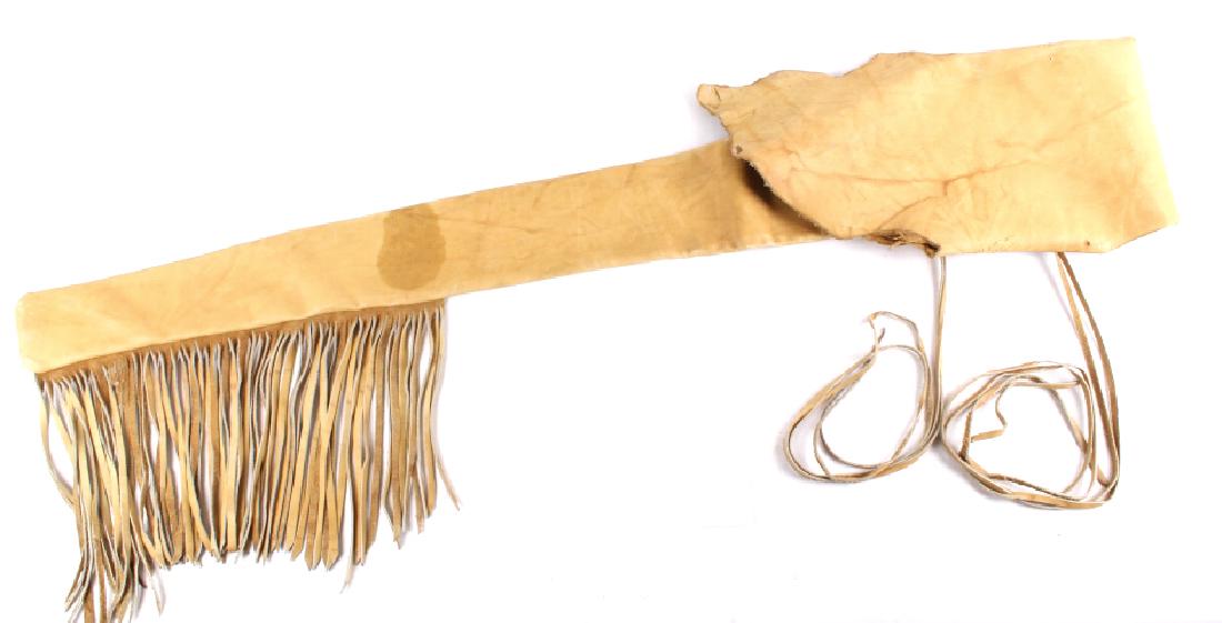 Custom Rawhide Leather Scabbard With Fringe: This lot is a custom rawhide leather scabbard with fringe. It features a rawhide leather fringed design, that is made to cover and protect a rifle completely. The leather is supple and well cared for,